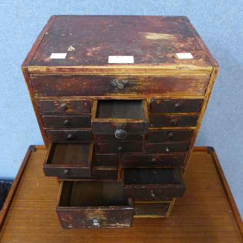 353 - A Victorian pine twenty drawer table top chest