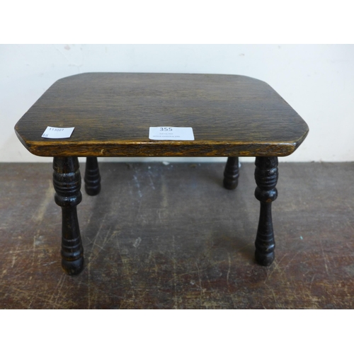 355 - A small 19th century oak milking stool