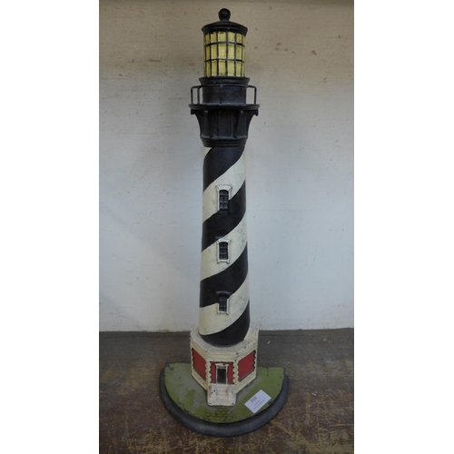 358 - A cast iron lighthouse door stop