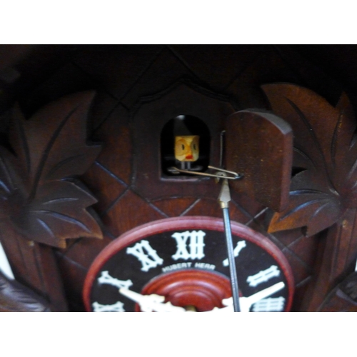 359 - A German carved cuckoo clock