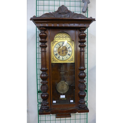 363 - A 19th Century walnut Vienna wall clock