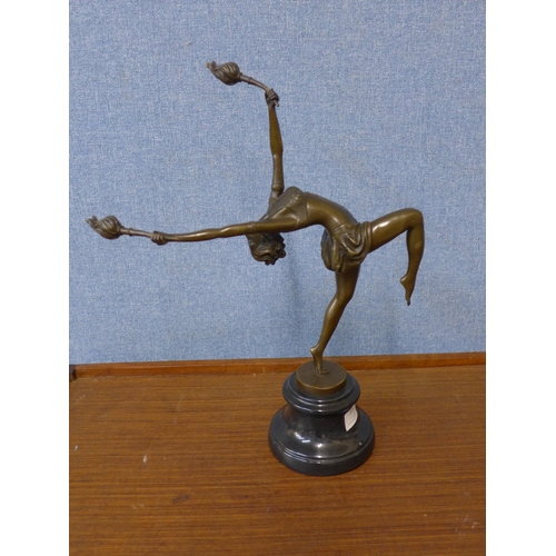 371 - An Art Deco style bronze figure of a female dancer, on black marble socle