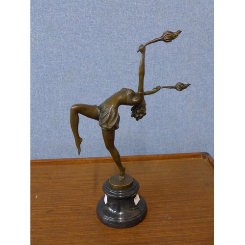 371 - An Art Deco style bronze figure of a female dancer, on black marble socle