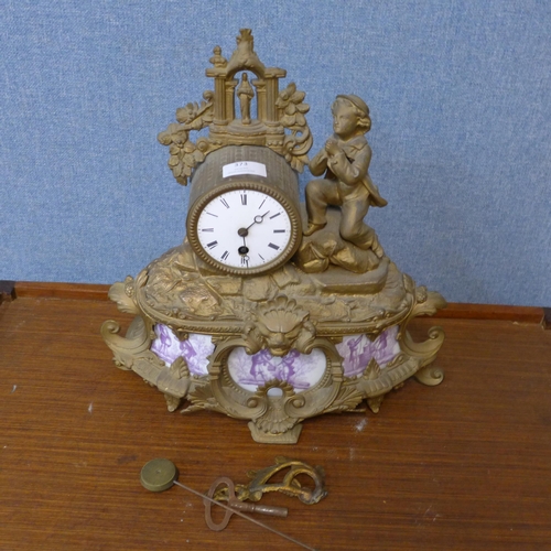 373 - A 19th Century French gilt metal and porcelain mantel clock