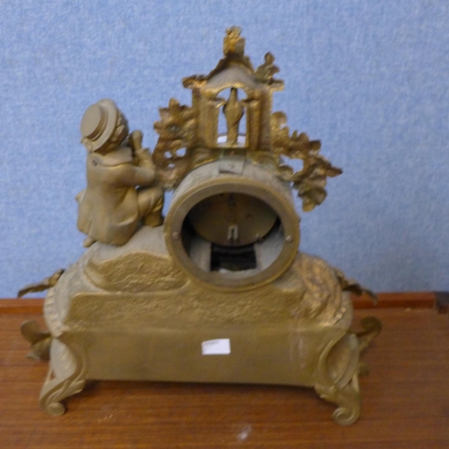 373 - A 19th Century French gilt metal and porcelain mantel clock