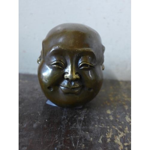 377 - A small bronze four faced Buddha