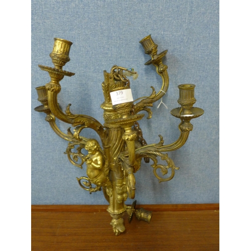 379 - A French ormolu figural cherub chandelier