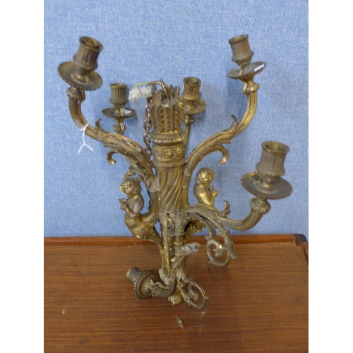 379 - A French ormolu figural cherub chandelier