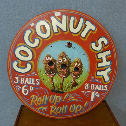 386 - A circular painted wooden circular Coconut Shy sign