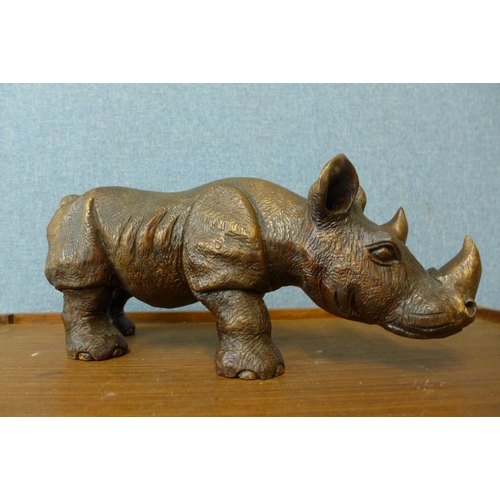 397 - A carved hardwood rhinoceros, a/f