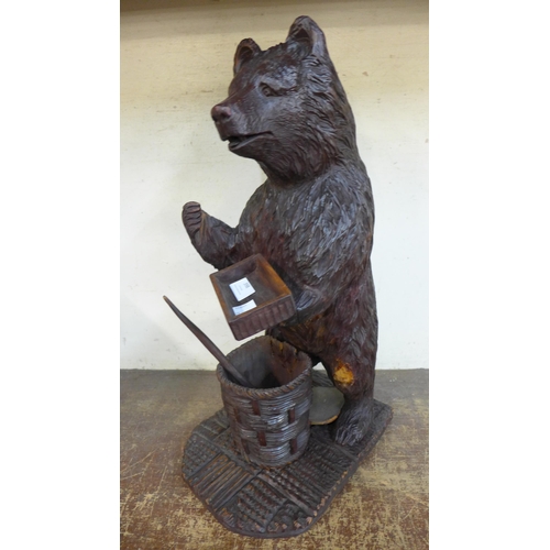 398 - A large Black Forest carved softwood figure of a bear