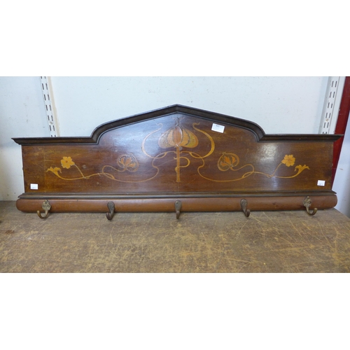 401 - An Art Nouveau inlaid mahogany coat rack