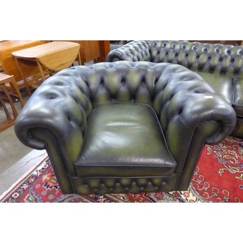 51 - A green leather Chesterfield club chair