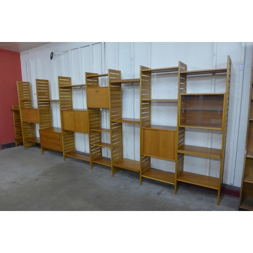 61 - A Staples teak eight bay Ladderax modular room divider