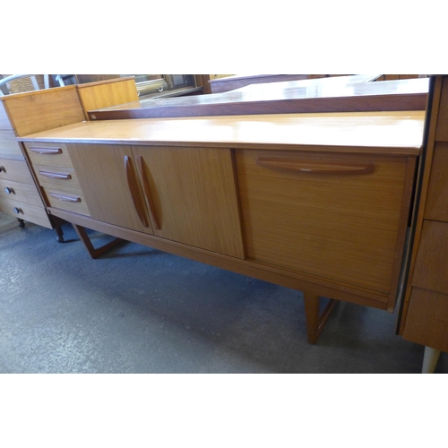 66 - A teak sideboard