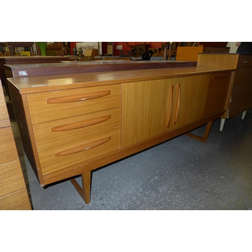 66 - A teak sideboard