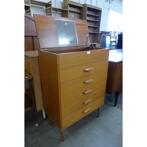 69 - A teak dressing chest