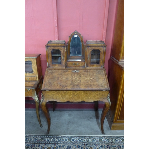 7 - A Victorian inlaid walnut bureau de dame