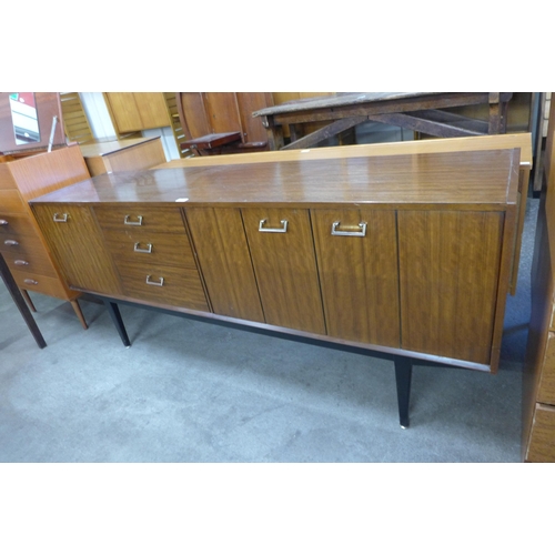 70 - A Nathan tola wood and black sideboard