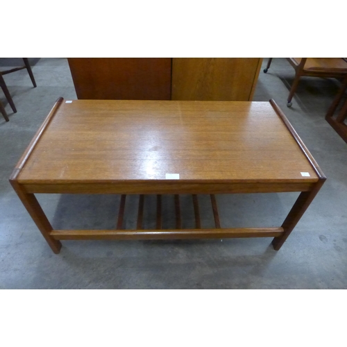 75 - A teak coffee table