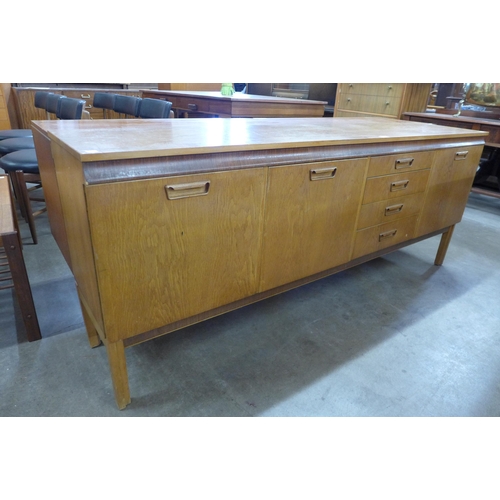 76 - A teak sideboard