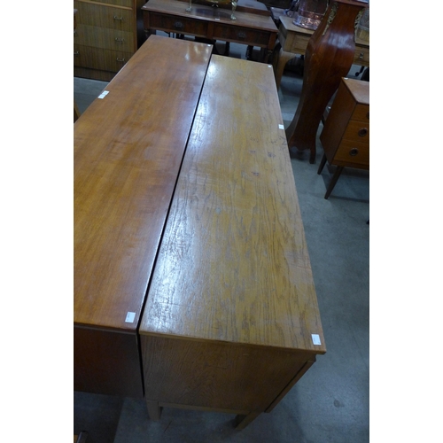 76 - A teak sideboard