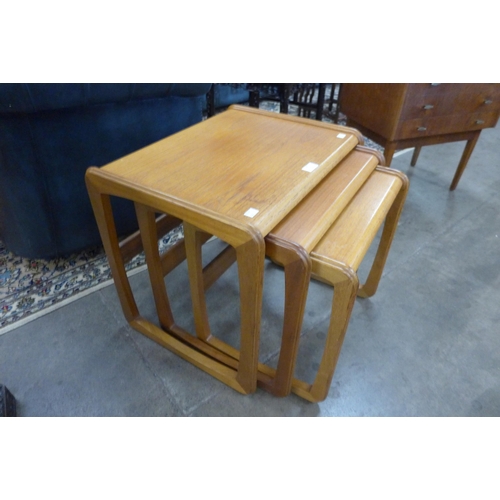 77 - A teak nest of tables