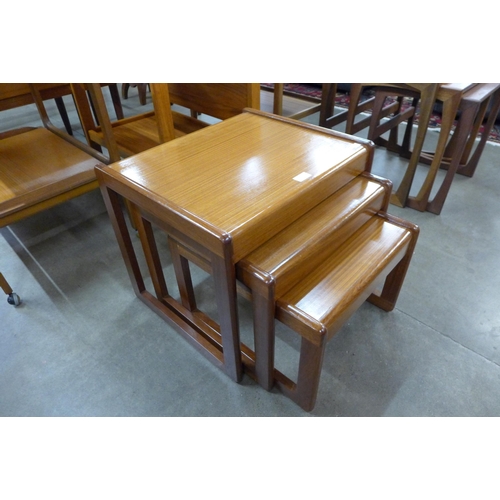 83 - A teak nest of tables