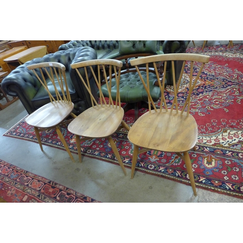 87 - A set of three Ercol Blonde elm and beech model 376 Candlestick Lattice dining chairs