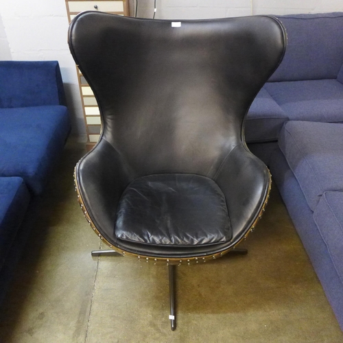 1356 - An Aviator Keeler black leather and vintage jet brass egg chair