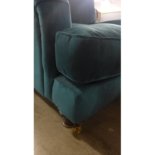 1382 - A sea green velvet armchair