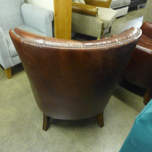 1392 - A pair of Stanford Oliato hazel leather button back and studded chairs - scuffed