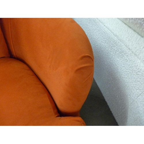 1416 - A tangerine shell velvet swivel loveseat