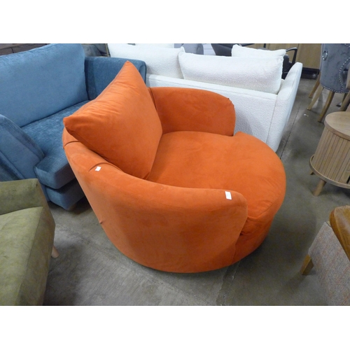 1416 - A tangerine shell velvet swivel loveseat