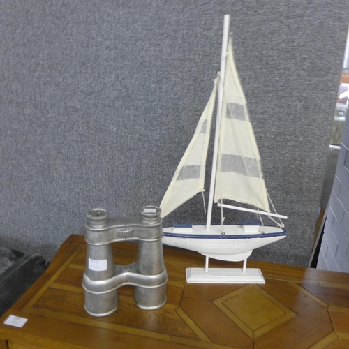 1443 - A hand painted model sailing ship and a pair of silver binoculars