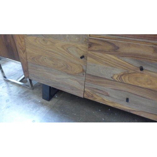 1544 - A hardwood and black metal two door and three drawer sideboard