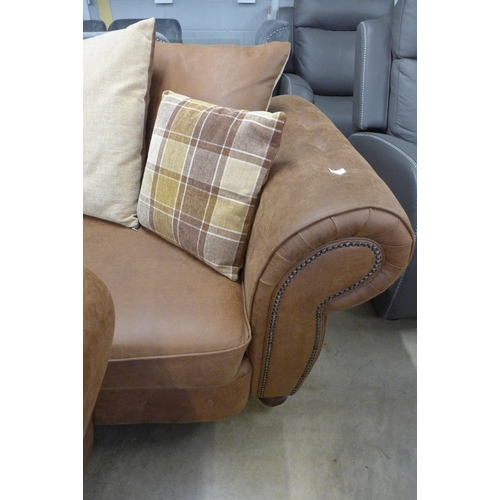 1557 - A County brown faux leather button back and studded four seater sofa and loveseat