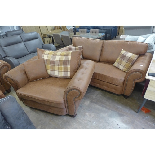 1558 - A County brown faux leather button back and studded three seater sofa and loveseat