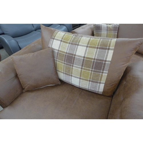 1558 - A County brown faux leather button back and studded three seater sofa and loveseat