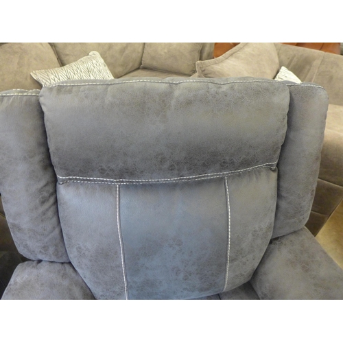 1559 - A Burnley charcoal faux leather and white stitching two seater power reclining sofa with centre cons... 