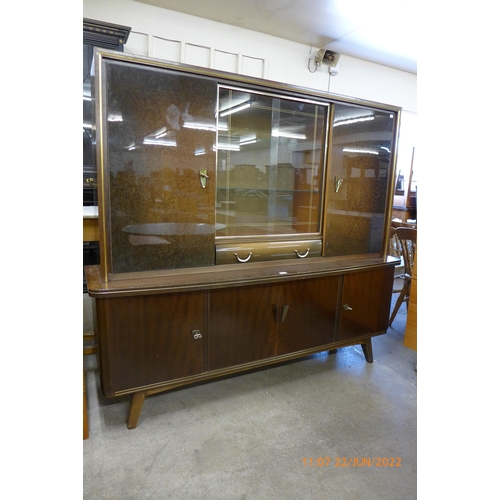 88 - A German Mignon Mobel simulated walnut cocktail cabinet