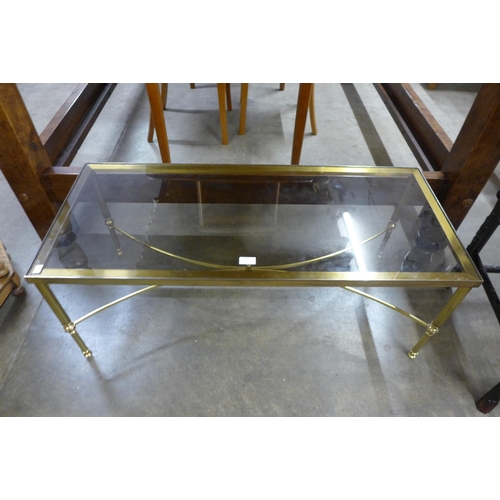 104 - An Italian rectangular brass and glass topped coffee table