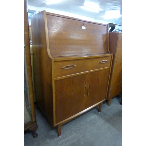 81 - A Jentique teak bureau