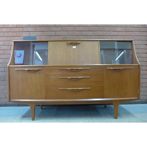 90 - A Jentique teak highboard