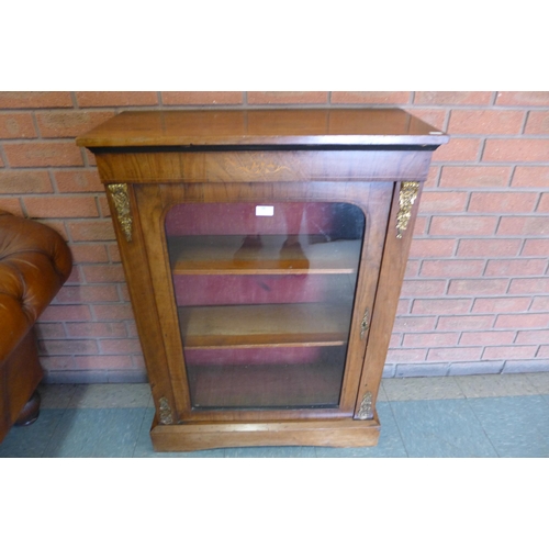 98 - A Victorian inlaid walnut and gilt metal mounted pier cabinet