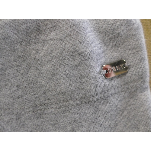 3096 - Two pairs of Women's Grey DKNY Sport tracksuit bottoms, 1 size L and 1 size XL * this lot is subject... 