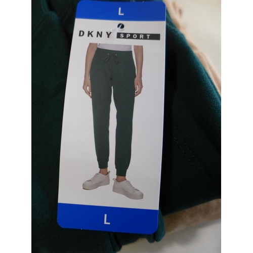 3097 - Two pairs of Women's DKNY Sport tracksuit bottoms, mixed sizes and colours * this lot is subject to ... 
