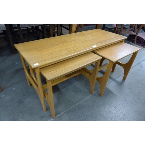 79 - A teak nest of tables