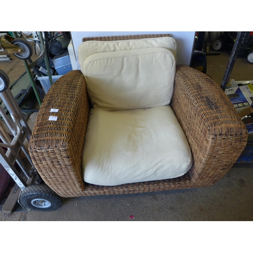 2070 - Garden rattan armchair with cushions