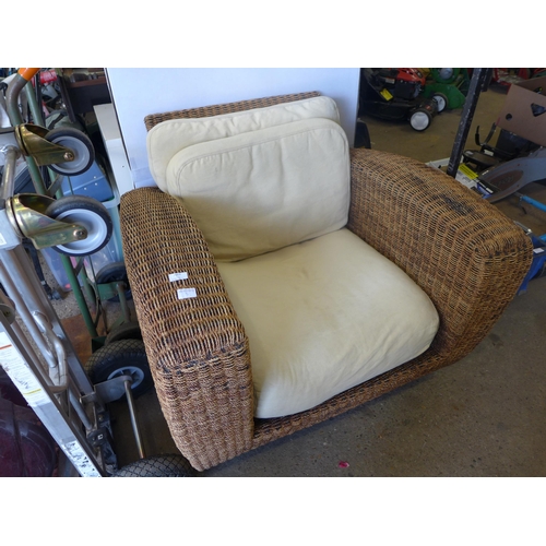 2070 - Garden rattan armchair with cushions